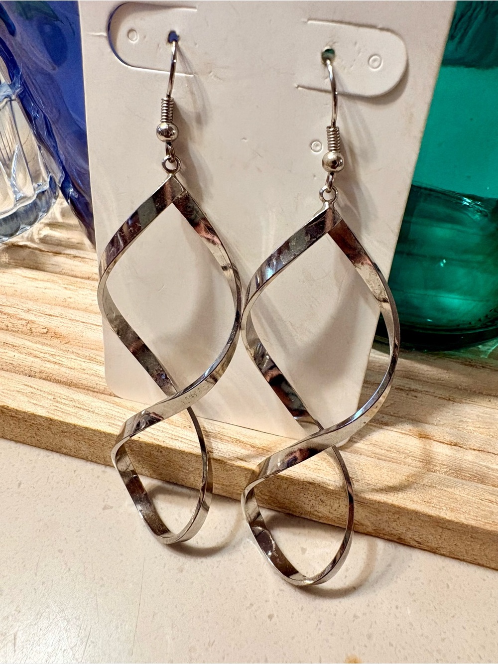 Double helix earrings in silver tone